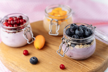 Natural Greek Yogurt With Fresh Berries And Granola In Jar. Healthy Eating, Healthy Lifestyle
