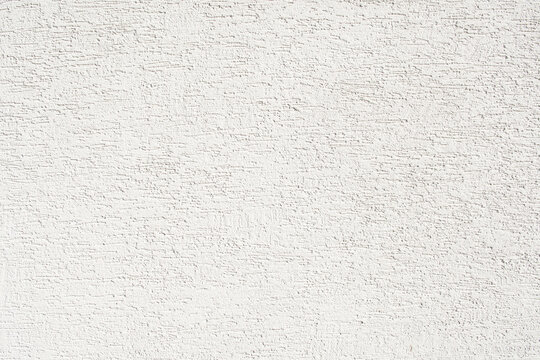 White rough plaster on wall