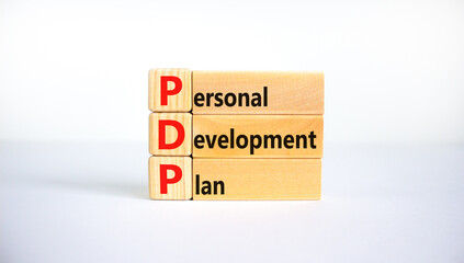 PDP, Personal development plan symbol. Words PDP, Personal development plan symbol on blocks on a...