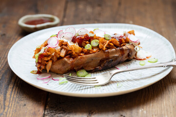 Baked sweet potato with barbeque jackfruit