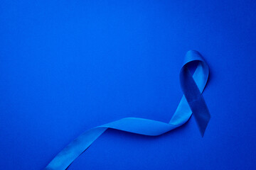 Blue ribbon cancer. Awareness of men health in November with blue prostate cancer ribbon isolated...