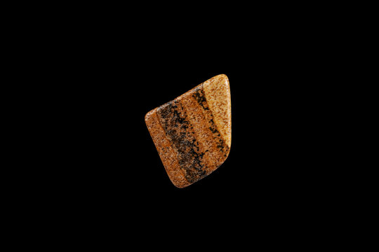 Close-up Picture Jasper stone isolated on a black background.