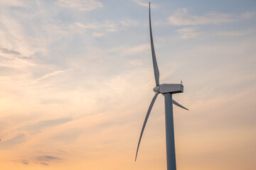 Side view of single wind turbine or wind mill with copy space.