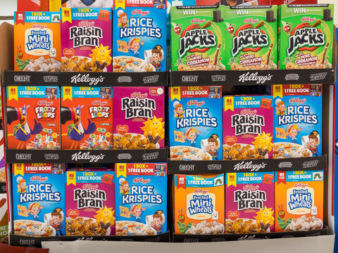 NORTH PORT, FLORIDA - SEPTEMBER 15, 2021: Kellogg's cereal display at grocery store supermarket. Boxes of Kellogg's Apple Jacks, Rice Krispies, Raisin Bran, Frosted Mini Wheats, and Fruit Loops.