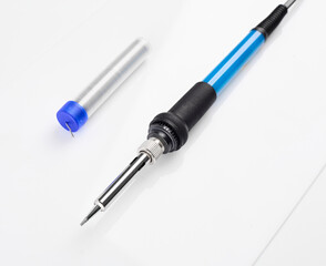 Soldering iron isolated on a white background. A tool for soldering wires, installing pipes, tinning or burning out. 