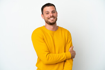 Young Brazilian man isolated on white background laughing