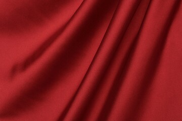 Fototapeta na wymiar Draped red silk fabric background