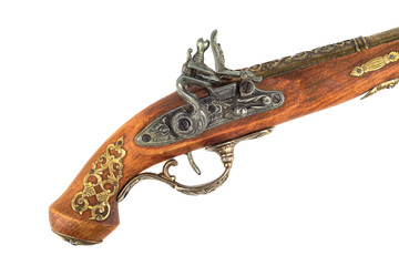 Antique pistol inlaid handle and trigger mechanism.