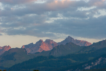 Majestic panoramic view of mountains in canton Schwyz with beautiful cloudscape