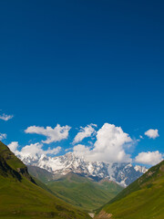 Fototapeta premium Snow covered pick of Mount Shkhara