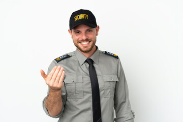 Young security Brazilian man isolated on white background inviting to come with hand. Happy that you came
