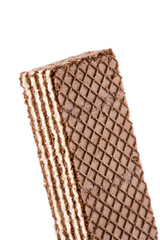 Tasty wafer sticks on white background, flat lay. Sweet food. Square wafer biscuits isolated on white. 