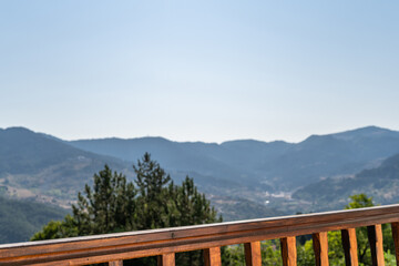 Fototapeta na wymiar Wooden balcony railing in the mountains