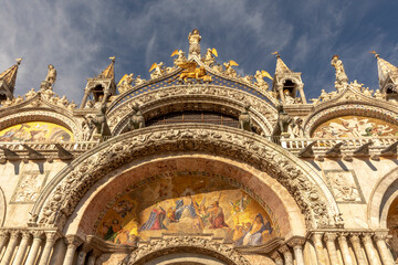 Fresco mosaic on the entrance facade of St. Mark's Basilica at St. Marks Square in Venice