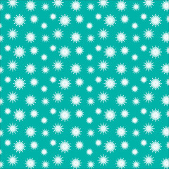A pattern of white snowflakes on a turquoise background