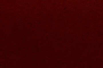 Dark non-uniform paper with spots and inclusions.