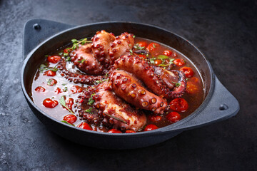 Traditional Italian polpo alla griglia in salsa di pomodoro with barbecued octopus in tomato sauce...