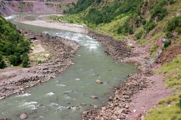 Small River Flowing Over Rocks light green Water