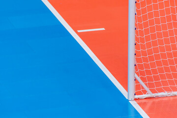 Field hockey, futsal or handball gate equipment in a sports hall gym. Professional sport concept....