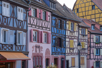 Obraz premium Colmar, France - 09 16 2021: Typical houses and colorful facades in the little Venice.