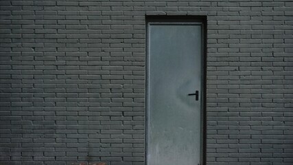 metal door on a brick facade