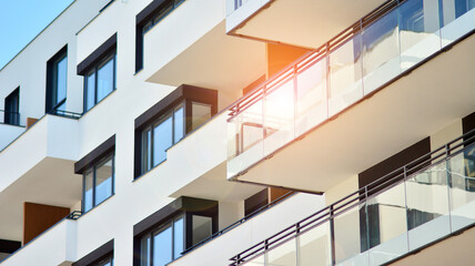 Modern apartment building on a sunny day. Architectural details and facade of a modern apartment building.