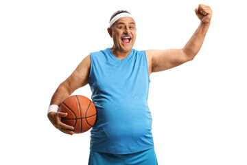 Happy mature man holding a basketball and gesturing with hand