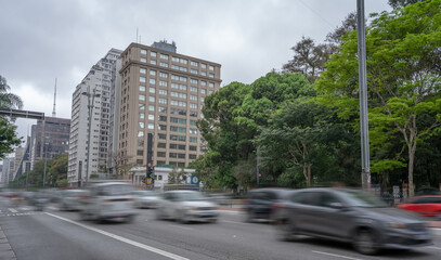moving cars on Avenida Paulista in São Paulo. blurred cars on the country's busiest shopping street
