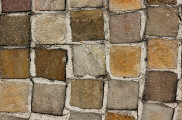 mosaic floor background, with tiles of different colors 