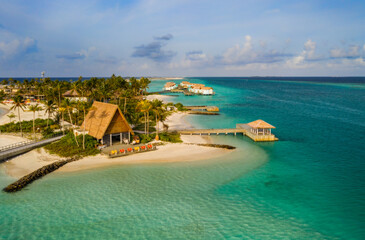 Amazing bird eyes view in Maldives island Eh'mafushi crossroads maldives at sunrise. Aerial drone shot. Hard rock hotel. July 2021