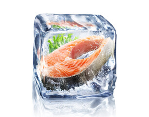 Piece of frozen trout in ice cube isolated on white background with clipping path.