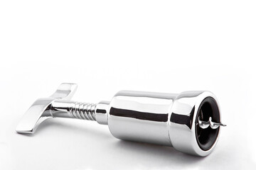 Shiny metallic corkscrew on white background with space for text, minimal concept, wine bottle...