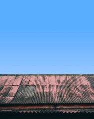 The tile roofs of the ancient chinese temple isolated on blue sky.