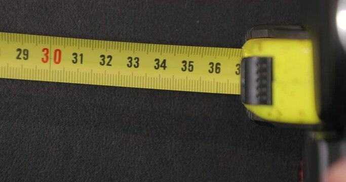 Using measuring tape