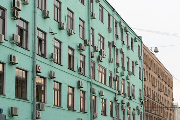 Naklejka premium green building facade in the city
