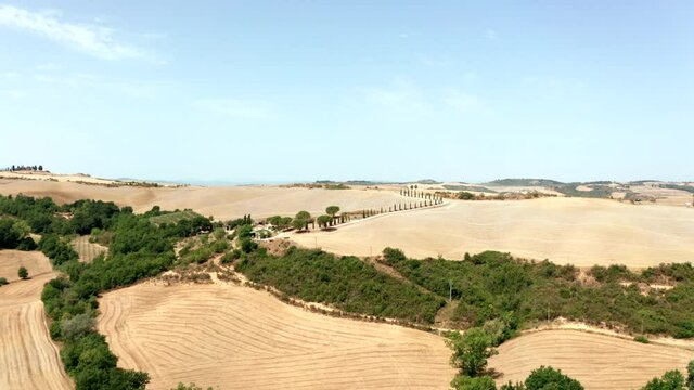 Aerial clip showing the peaceful fields of Tuscany, Italy.