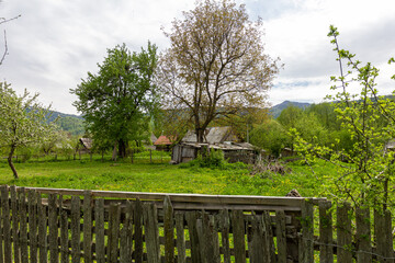 A chalet, a mountain village, an old style of architecture a variety of buildings and court...