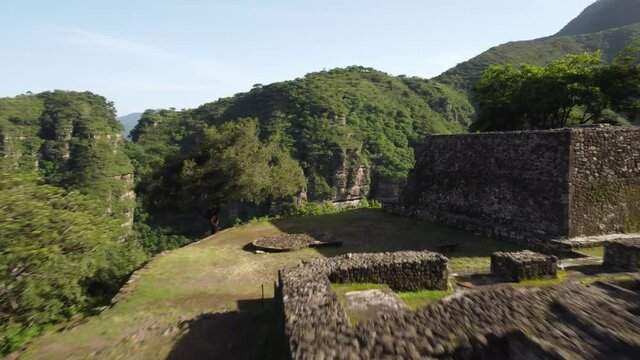 Pyramide in the jungle. The house of the eagles is located in Malinalco, Mexico. The old Aztec ruins were once a retreat for the elite jaguar and eagle warriors. Stunning jungle scenery cinematic.