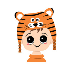 Avatar of a child with big eyes and a wide smile in a tiger hat. Cute kid with a joyful face in a festive costume for new year and Christmas. Head of adorable baby with happy emotions
