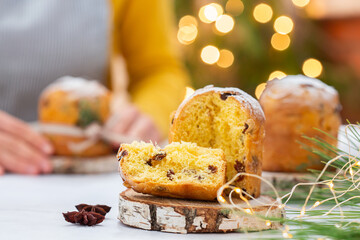 Traditional Italian Christmas cake Panettone with festive decorations 