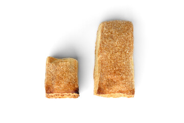 Puff pastry bun (tongue) isolated on white background.