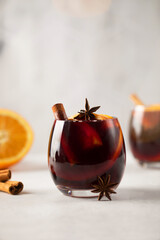 Homemade red mulled wine on table with ingredients