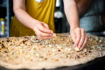 Making bread with cheese and nuts in the bakery