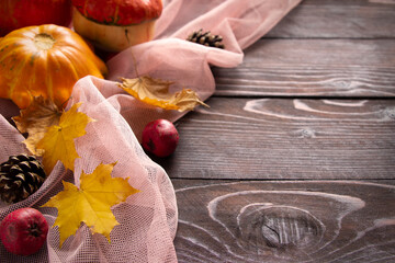 Autumn pumpkins background on wooden brown board.. Thanksgiving and Halloween template
