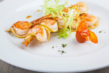 shrimp kebabs on a white plate

