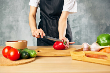 Cook woman lunch at home vegetarian food cutting board