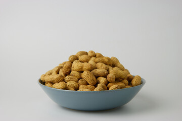 Peanuts in Blue Bowl Close Up