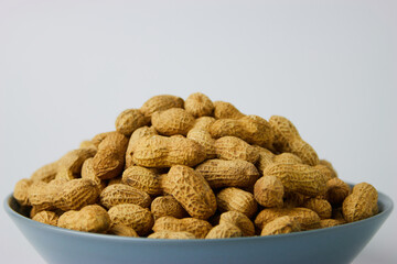 Peanuts in Blue Bowl Close Up