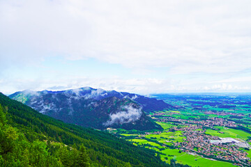 Fototapeta na wymiar View of the panorama landscape from the Breitenberg near Pfronten. Nature in the Allgäu, Bavaria.