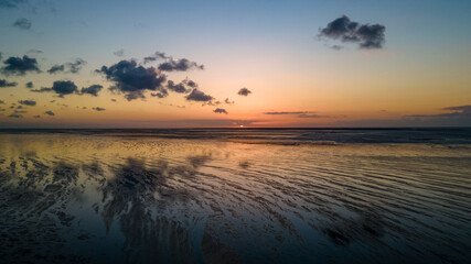 Sunset over the Wadden Sea at ebb in the North Sea - Drone Perspective Landscape Photography